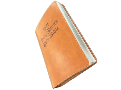 King James 1611 Bible tan, held in hands